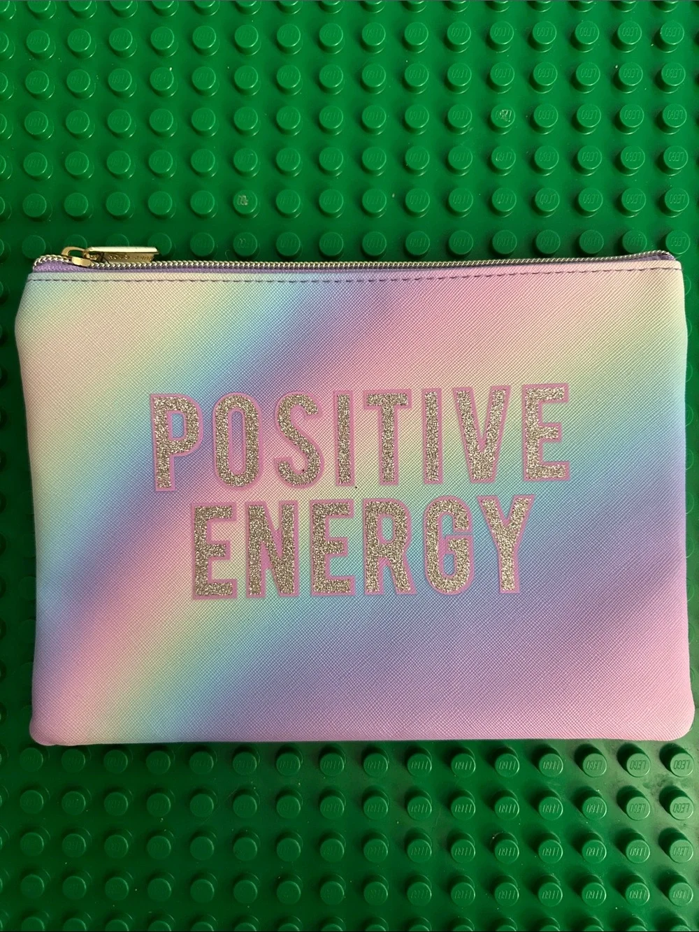 Ruby & Cash Pastel Ombré Zippered Makeup Pouch, has the phrase Positive Energy